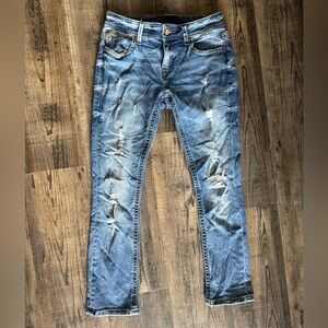 Women's Distressed Blue Jeans